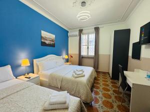 Postel nebo postele na pokoji v ubytování Villa Matilde
