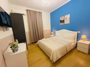 Postel nebo postele na pokoji v ubytování Villa Matilde