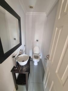 Et badeværelse på Edificio Duble Santiago del Estero - alquiler minimo 15 dias