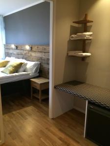 Postel nebo postele na pokoji v ubytování Hotel Falun