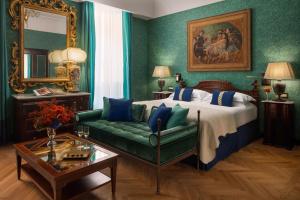Giường trong phòng chung tại Hotel d’Inghilterra Roma – Starhotels Collezione