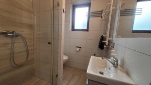 Koupelna v ubytování Wrzosowe Wzgórze Apartamenty