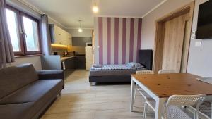 Posezení v ubytování Wrzosowe Wzgórze Apartamenty