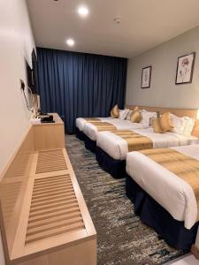 Letto o letti in una camera di فندق مثابة مكة