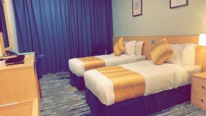 Letto o letti in una camera di فندق مثابة مكة