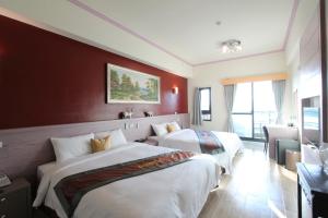 Postel nebo postele na pokoji v ubytování Emilia Resort I