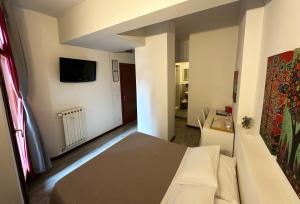 TV a/nebo společenská místnost v ubytování B&B Alla Casa di Lucia