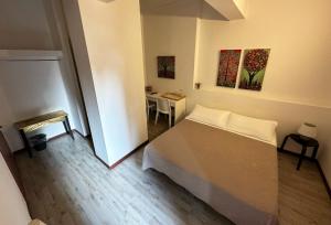 Postel nebo postele na pokoji v ubytování B&B Alla Casa di Lucia