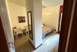Postel nebo postele na pokoji v ubytování B&B Alla Casa di Lucia