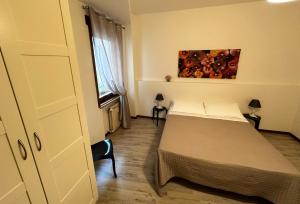 Postel nebo postele na pokoji v ubytování B&B Alla Casa di Lucia
