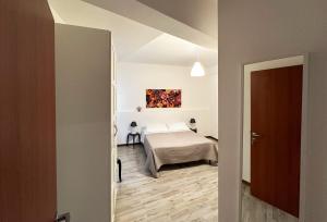 Postel nebo postele na pokoji v ubytování B&B Alla Casa di Lucia