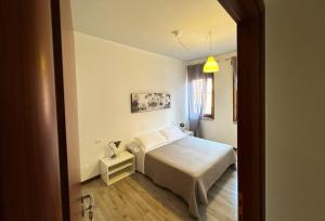 Postel nebo postele na pokoji v ubytování B&B Alla Casa di Lucia