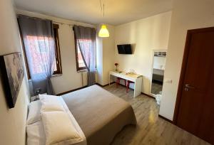 TV a/nebo společenská místnost v ubytování B&B Alla Casa di Lucia