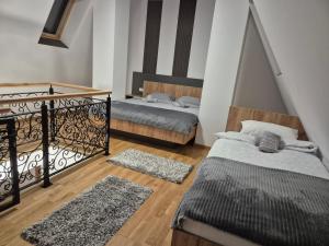 Giường trong phòng chung tại Jagodić lux
