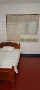 Postel nebo postele na pokoji v ubytování Farming Hostel Ahangama