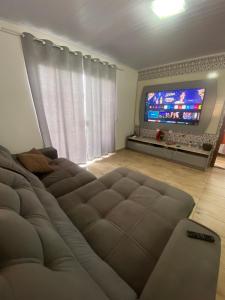 TV a/nebo společenská místnost v ubytování Casa de praia