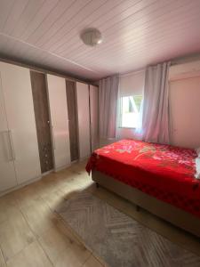 Postel nebo postele na pokoji v ubytování Casa de praia