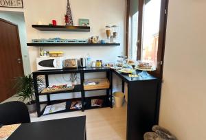 Kuchyň nebo kuchyňský kout v ubytování B&B Alla Casa di Lucia