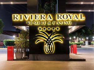 Ein Zertifikat, Auszeichnung, Logo oder anderes Dokument, das in der Unterkunft Riviera Royal Hotel ausgestellt ist
