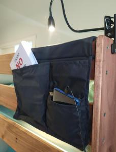 a black bag sitting on top of a table at La Hospedería in Oviedo