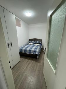 Postelja oz. postelje v sobi nastanitve Apartman Anastasija