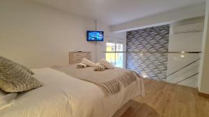 Posteľ alebo postele v izbe v ubytovaní Duplex Huelin I & Beach