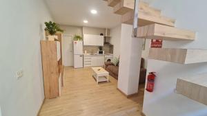 Kuchyňa alebo kuchynka v ubytovaní Duplex Huelin I & Beach