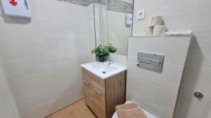 Kúpeľňa v ubytovaní Duplex Huelin I & Beach