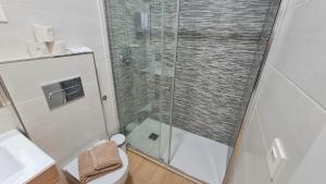 Kúpeľňa v ubytovaní Duplex Huelin I & Beach
