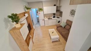 Kuchyňa alebo kuchynka v ubytovaní Duplex Huelin I & Beach