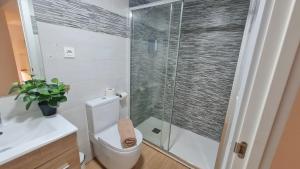 Kúpeľňa v ubytovaní Duplex Huelin I & Beach