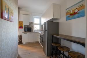 Kuchyň nebo kuchyňský kout v ubytování Libeccio House