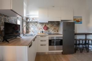 Kuchyň nebo kuchyňský kout v ubytování Libeccio House + 5 fotografií