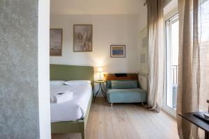 Postel nebo postele na pokoji v ubytování Libeccio House