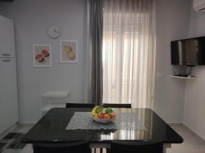 TV a/nebo společenská místnost v ubytování Casa Orchidea Mazzeo