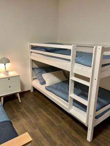 Postel nebo postele na pokoji v ubytování Domek Prosetin244
