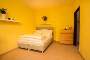 Voodi või voodid majutusasutuse Hirschenhof Apartments toas