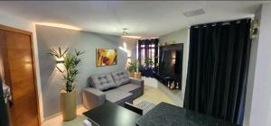 Ruang duduk di Maravilhoso Flat Natal