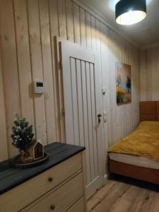Posteľ alebo postele v izbe v ubytovaní Domek Relaks pod Śnieżką