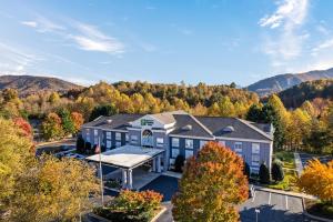 an aerial view of a home in the mountains at Holiday Inn Express & Suites Sylva / Dillsboro by IHG in Dillsboro