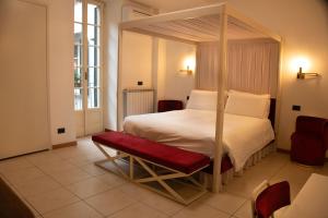 Postel nebo postele na pokoji v ubytování Hotel Suisse