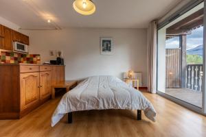 Escapade Perchée - Vue - Balcon - Parking客房内的一张或多张床位