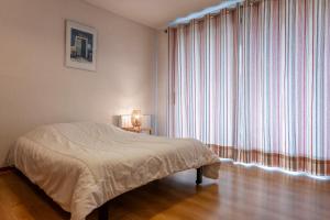Escapade Perchée - Vue - Balcon - Parking客房内的一张或多张床位