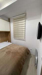 Łóżko lub łóżka w pokoju w obiekcie Geregs alibi - free Spa