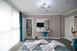 Postel nebo postele na pokoji v ubytování Hill Life Hotel