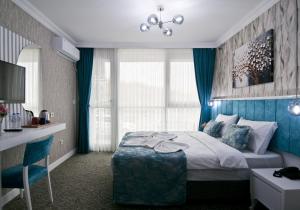 Postel nebo postele na pokoji v ubytování Hill Life Hotel