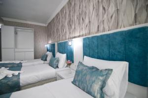 Postel nebo postele na pokoji v ubytování Hill Life Hotel