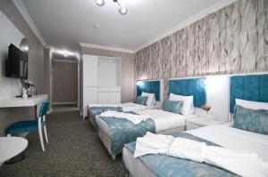 Postel nebo postele na pokoji v ubytování Hill Life Hotel
