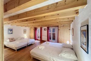 Ένα ή περισσότερα κρεβάτια σε δωμάτιο στο Chalet La Marmottière +6 φωτογραφίες