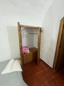 Ένα ή περισσότερα κρεβάτια σε δωμάτιο στο Casa Cueva la estación